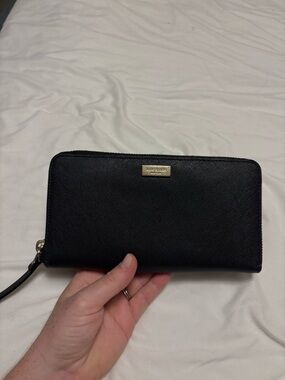 kate spade black saffiano zip wallet with gold plaque